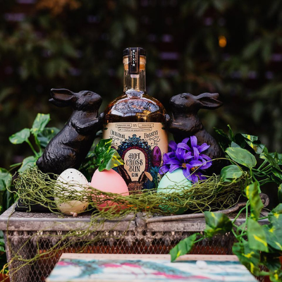 hot cross bun gin bottle with bunny, easter eggs and foilage